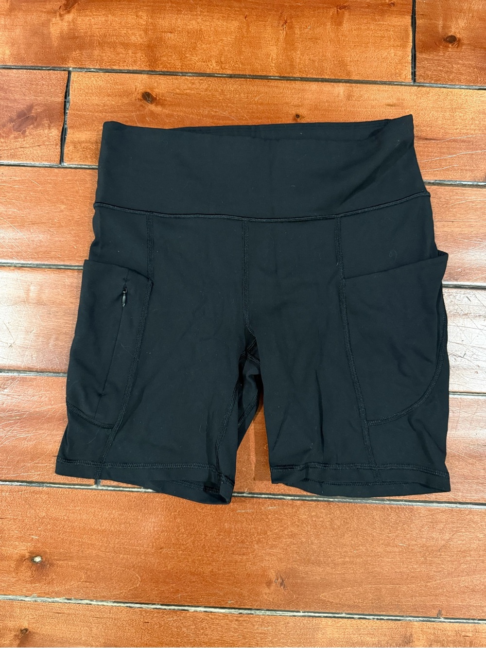 High-Waist Black Women’s Athleta biker Shorts with Side Pockets